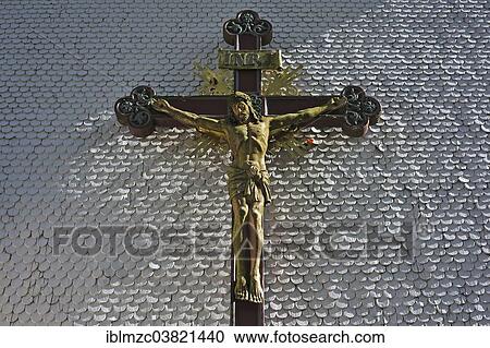 "Carved wooden crucifix on the shingle facade of the parish church of St. Margaret, from 1791, Kleinweiler, Upper Allgaeu, Bavaria, Germany, Europe" View Large Photo Image Stock Image - "Carved wooden crucifix on the shingle facade of the parish church of St. Margaret, from 1791, Kleinweiler, Upper Allgaeu, Bavaria, Germany, Europe". Fotosearch