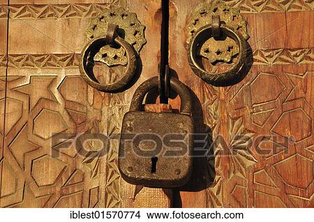 "Carved wooden door with lock, historic town of Bukhara, Buchara, Silk Road, Unesco World Heritage Site, Uzbekistan, Central Asia, Asia" View Large Photo Image Picture - "Carved wooden door with lock, historic town of Bukhara, Buchara, Silk Road, Unesco World Heritage Site, Uzbekistan, Central Asia, Asia". Fotosearch