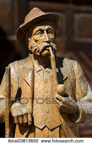 "Carved wooden figure, man with pipe, Mittenwald, Werdenfelser Land, Upper Bavaria, Bavaria, Germany, Europe" View Large Photo Image Stock Image - "Carved wooden figure, man with pipe, Mittenwald, Werdenfelser Land, Upper Bavaria, Bavaria, Germany, Europe". Fotosearch