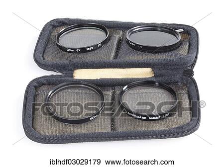 Stock Photo - Case with different filters for a camera lens. Fotosearch