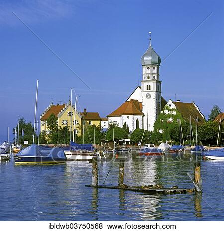 Stock Photo - "Castle and parish church of St. George, Lake Constance, Wasserburg - Bodensee, Swabia, Bavaria, Germany, Europe". Fotosearch