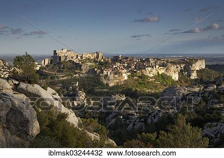 "Castle ruins above the village in the evening light, Les Baux-de-Provence, Departement Bouches-du-Rhone, Region Provence-Alpes-Cote d’Azur d’Azur, France, Europe" View Large Photo Image Stock Image - "Castle ruins above the village in the evening light, Les Baux-de-Provence, Departement Bouches-du-Rhone, Region Provence-Alpes-Cote d’Azur d’Azur, France, Europe". Fotosearch