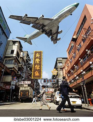 "Cathay Pacific aircraft approaching Kai Tak Airport over the rooftops of Kowloon, Hong Kong, China, Asia, Kowloon, Hong Kong, Hong Kong, China, People's Republic of China, Asia" View Large Photo Image Picture - "Cathay Pacific aircraft approaching Kai Tak Airport over the rooftops of Kowloon, Hong Kong, China, Asia, Kowloon, Hong Kong, Hong Kong, China, People's Republic of China, Asia". Fotosearch