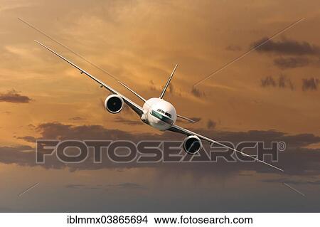 Cathay Pacific Boeing 777-367 ER in flight in the evening light View Large Photo Image Picture - Cathay Pacific Boeing 777-367 ER in flight in the evening light. Fotosearch