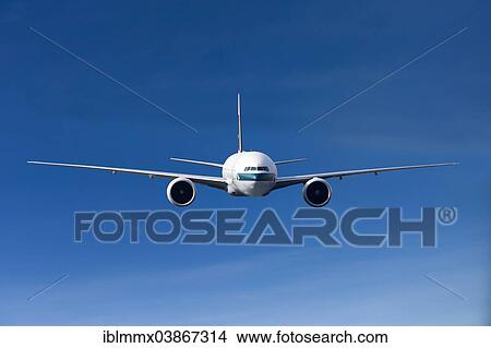 Cathay Pacific Boeing 777-367 ER in flight View Large Photo Image Picture - Cathay Pacific Boeing 777-367 ER in flight. Fotosearch