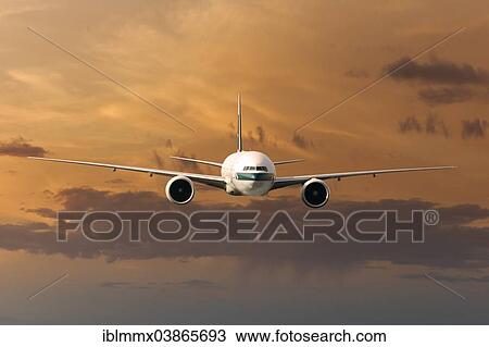 Cathay Pacific Boeing 777-367 ER in flight in the evening light View Large Photo Image Stock Image - Cathay Pacific Boeing 777-367 ER in flight in the evening light. Fotosearch