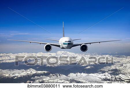 Cathay Pacific Boeing 777-367 ER in flight over mountains View Large Photo Image Stock Image - Cathay Pacific Boeing 777-367 ER in flight over mountains. Fotosearch