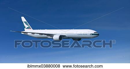 Cathay Pacific Boeing 777-367 ER in flight View Large Photo Image Stock Photo - Cathay Pacific Boeing 777-367 ER in flight. Fotosearch