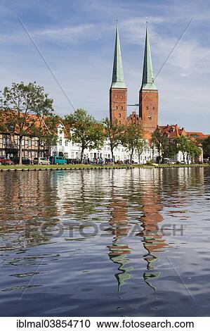 "Cathedral reflected in Stadttrave river or Trave River, Lubeck, Schleswig-Holstein, Germany, Europe" View Large Photo Image Stock Image - "Cathedral reflected in Stadttrave river or Trave River, Lubeck, Schleswig-Holstein, Germany, Europe". Fotosearch