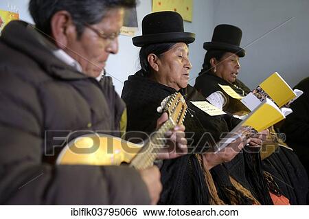 "Catholic base community, Bolivians in the traditional dress of the Quechua Indians making music and singing together, El Alto, Departamento La Paz, Bolivia, South America" View Large Photo Image Stock Photograph - "Catholic base community, Bolivians in the traditional dress of the Quechua Indians making music and singing together, El Alto, Departamento La Paz, Bolivia, South America". Fotosearch