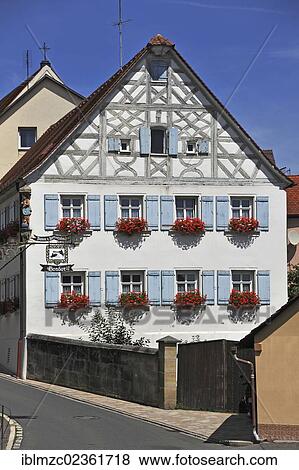 "Catholic Parish office of St. Kunigund, a historic half-timbered house built in 1752, Marktplatz square 27, Schnaittach, Middle Franconia, Bavaria, Germany, Europe" View Large Photo Image Stock Photo - "Catholic Parish office of St. Kunigund, a historic half-timbered house built in 1752, Marktplatz square 27, Schnaittach, Middle Franconia, Bavaria, Germany, Europe". Fotosearch