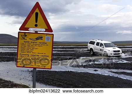 Caution sign, 4WD vehicle negotiating river crossing, Highlands, Northern Iceland, Europe View Large Photo Image Stock Image - Caution sign, 4WD vehicle negotiating river crossing, Highlands, Northern Iceland, Europe. Fotosearch
