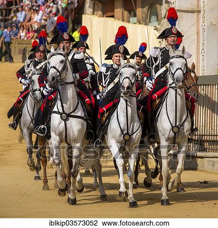 Stock Image - "Cavalry charge, historical parade, Siena, Tuscany, Italy, Europe". Fotosearch