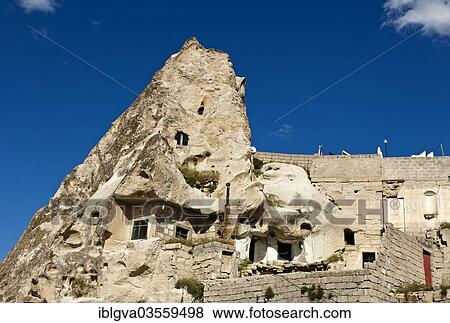 "Cave dwellings in hollowed tuff rock, Goreme, Cappadocia, Nevsehir Province, Central Anatolia Region, Turkey, Asia" View Large Photo Image Stock Photo - "Cave dwellings in hollowed tuff rock, Goreme, Cappadocia, Nevsehir Province, Central Anatolia Region, Turkey, Asia". Fotosearch