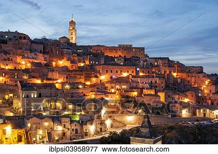 "Cave houses of Sasso Caveoso at dusk, Sassi di Matera, Basilicata, Italy, Europe" View Large Photo Image Stock Photo - "Cave houses of Sasso Caveoso at dusk, Sassi di Matera, Basilicata, Italy, Europe". Fotosearch