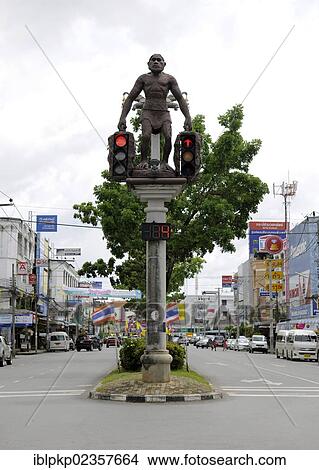 "Caveman sculpture holding traffic lights, Krabi Town, Krabi, Thailand, Asia" View Large Photo Image Picture - "Caveman sculpture holding traffic lights, Krabi Town, Krabi, Thailand, Asia". Fotosearch