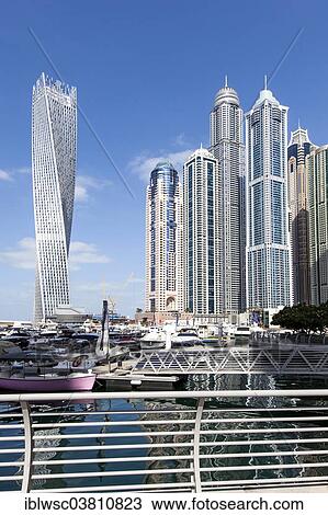 "Cayan Tower and skyscrapers with marina, Dubai Marina, Dubai, United Arab Emirates, Asia" View Large Photo Image Stock Image - "Cayan Tower and skyscrapers with marina, Dubai Marina, Dubai, United Arab Emirates, Asia". Fotosearch
