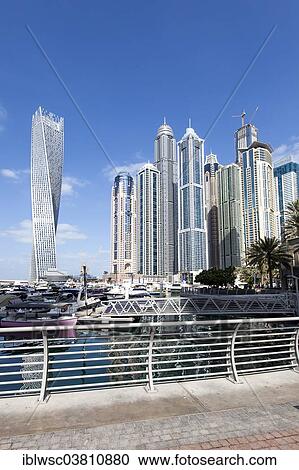"Cayan Tower and skyscrapers with marina, Dubai Marina, Dubai, United Arab Emirates, Asia" View Large Photo Image Stock Image - "Cayan Tower and skyscrapers with marina, Dubai Marina, Dubai, United Arab Emirates, Asia". Fotosearch