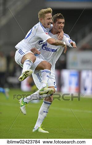 Celebration a goal, Roman Neustaedter carrying Lewis Holtby piggyback, both from Schalke 04, Wirsol Rhein-Neckar-Arena, Sinsheim-Hoffenheim, Baden-Wuerttemberg, Germany, Europe View Large Photo Image Picture - Celebration a goal, Roman Neustaedter carrying Lewis Holtby piggyback, both from Schalke 04, Wirsol Rhein-Neckar-Arena, Sinsheim-Hoffenheim, Baden-Wuerttemberg, Germany, Europe. Fotosearch