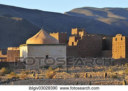 Stock Image - "Cemetery and Marabout at the Tamnougalt Kasbah, bei Agdz, Draatal, Tamnougalt, Souss-Massa-Draa region, Morocco, Africa". Fotosearch