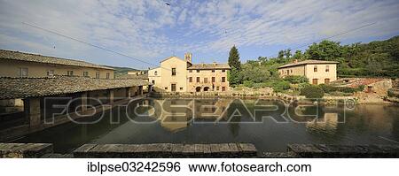 "Central village square with pools of hot spring, """"Square of Sources"""", Bagno Vignioni, San Quirico d'Orcia, Val d'Orcia, Province of Siena, Tuscany, Italy, Europe" View Large Photo Image Stock Photograph - "Central village square with pools of hot spring, """"Square of Sources"""", Bagno Vignioni, San Quirico d'Orcia, Val d'Orcia, Province of Siena, Tuscany, Italy, Europe". Fotosearch