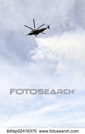 CH-53 helicopter carrying a water tank during an exercise, dropping 5000 liters of water, Laupheim, Baden-Wuerttemberg, Germany, Europe View Large Photo Image Stock Image - CH-53 helicopter carrying a water tank during an exercise, dropping 5000 liters of water, Laupheim, Baden-Wuerttemberg, Germany, Europe. Fotosearch