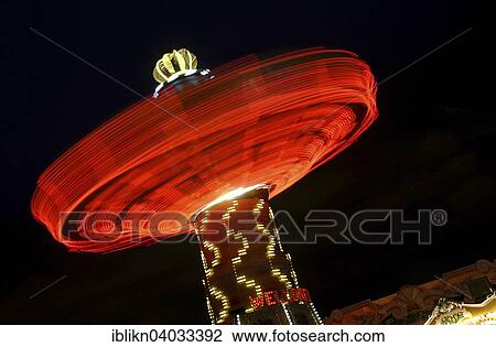 "Chairoplane carrousel, long exposure, Hamburger Dom funfair, Hamburg, Germany, Europe" View Large Photo Image Stock Image - "Chairoplane carrousel, long exposure, Hamburger Dom funfair, Hamburg, Germany, Europe". Fotosearch