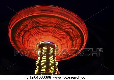 "Chairoplane carrousel, long exposure, Hamburger Dom funfair, Hamburg, Germany, Europe" View Large Photo Image Stock Photo - "Chairoplane carrousel, long exposure, Hamburger Dom funfair, Hamburg, Germany, Europe". Fotosearch