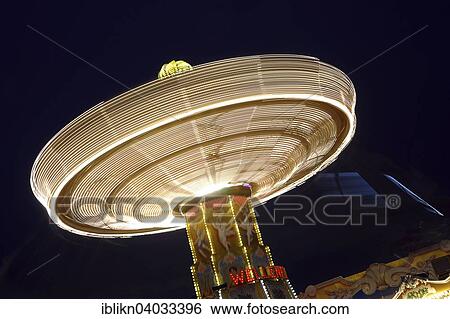 "Chairoplane carrousel, long exposure, Hamburger Dom funfair, Hamburg, Germany, Europe" View Large Photo Image Stock Photograph - "Chairoplane carrousel, long exposure, Hamburger Dom funfair, Hamburg, Germany, Europe". Fotosearch