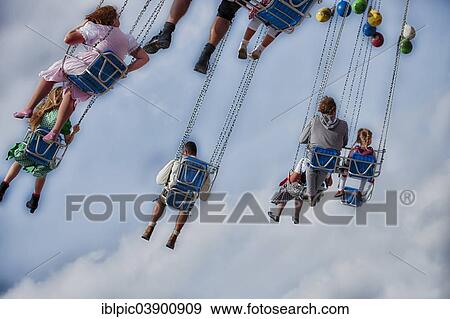 "Chairoplane or swing ride, Oktoberfest, Munich, Upper Bavaria, Bavaria, Germany, Europe" View Large Photo Image Stock Photo - "Chairoplane or swing ride, Oktoberfest, Munich, Upper Bavaria, Bavaria, Germany, Europe". Fotosearch