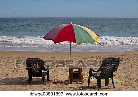 "Chairs and parasol on the beach, Sri Lanka, Asia" View Large Photo Image Stock Photo - "Chairs and parasol on the beach, Sri Lanka, Asia". Fotosearch