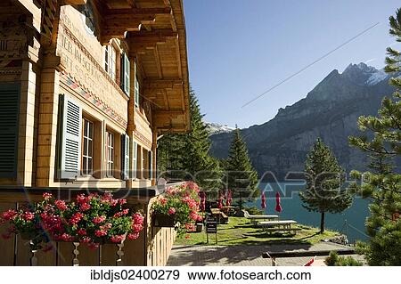 "Chalet, Oeschinensee lake, Kandersteg, Bernese Oberland, Canton of Bern, Switzerland, Europe" View Large Photo Image Stock Photo - "Chalet, Oeschinensee lake, Kandersteg, Bernese Oberland, Canton of Bern, Switzerland, Europe". Fotosearch