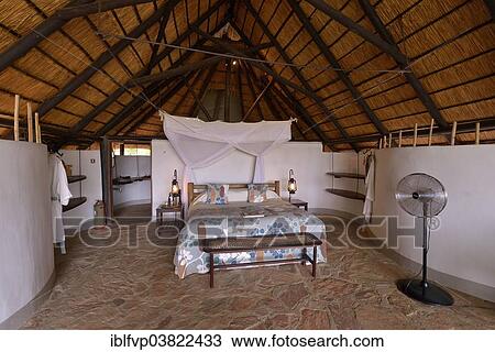 Stock Image - "Chalet of the Nkwali Lodge, Mfuwe, South Luangwa National Park, Zambia, Africa". Fotosearch