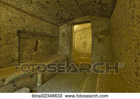"Chamber tomb, Tomba dei Letti, an antique round tumulus grave, Etruscan Necropolis of La Banditaccia, Necropoli della Banditaccia, Cerveteri, province of Rome, Lazio region, Italy, Europe" View Large Photo Image Stock Image - "Chamber tomb, Tomba dei Letti, an antique round tumulus grave, Etruscan Necropolis of La Banditaccia, Necropoli della Banditaccia, Cerveteri, province of Rome, Lazio region, Italy, Europe". Fotosearch