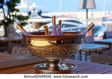 "Champagne cooler in the marina of Port Adriano, El Toro, Mallorca, Majorca, Balearic Islands, Spain, Europe" View Large Photo Image Stock Photo - "Champagne cooler in the marina of Port Adriano, El Toro, Mallorca, Majorca, Balearic Islands, Spain, Europe". Fotosearch