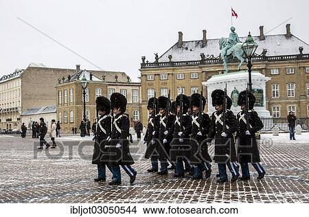 "Changing of the guard, royal bodyguards, ceremony outside the Amalienborg royal palace, Copenhagen, Capital Region of Denmark, Denmark, Europe" View Large Photo Image Picture - "Changing of the guard, royal bodyguards, ceremony outside the Amalienborg royal palace, Copenhagen, Capital Region of Denmark, Denmark, Europe". Fotosearch