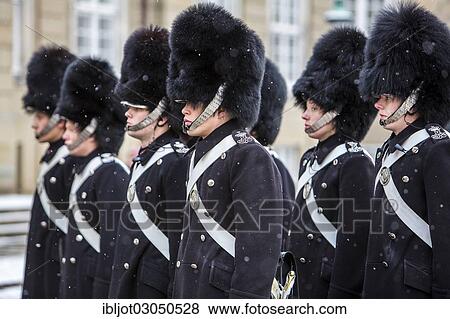 "Changing of the guard, royal bodyguards, ceremony outside Amalienborg royal palace, Copenhagen, Capital Region of Denmark, Denmark, Europe" View Large Photo Image Stock Photo - "Changing of the guard, royal bodyguards, ceremony outside Amalienborg royal palace, Copenhagen, Capital Region of Denmark, Denmark, Europe". Fotosearch