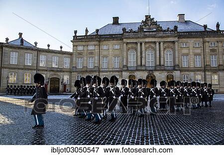 "Changing of the guard, royal bodyguards, ceremony outside Amalienborg royal palace, Copenhagen, Capital Region of Denmark, Denmark, Europe" View Large Photo Image Stock Photo - "Changing of the guard, royal bodyguards, ceremony outside Amalienborg royal palace, Copenhagen, Capital Region of Denmark, Denmark, Europe". Fotosearch