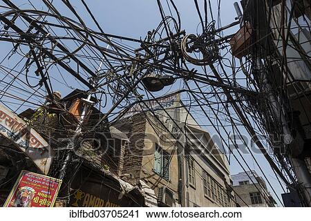"Chaotic arrangement of electricity cables in a side street, New Delhi, Delhi, India, Asia" View Large Photo Image Stock Image - "Chaotic arrangement of electricity cables in a side street, New Delhi, Delhi, India, Asia". Fotosearch