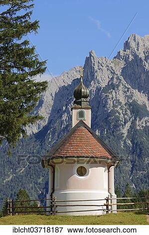 Stock Photo - "Chapel of Mary Queen in front of the Karwendel Mountains, near Mittenwald, Werdenfelser Land, Upper Bavaria, Bavaria, Germany, Europe". Fotosearch