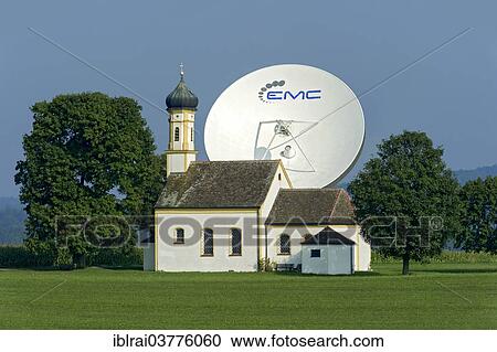 "Chapel of St. John in the Field in front of a parabolic antenna from the Erdfunkstelle Raisting earth station, Pfaffenwinkel, Upper Bavaria, Bavaria, Germany, Europe" View Large Photo Image Stock Image - "Chapel of St. John in the Field in front of a parabolic antenna from the Erdfunkstelle Raisting earth station, Pfaffenwinkel, Upper Bavaria, Bavaria, Germany, Europe". Fotosearch