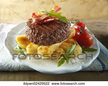 Char grilled beef burger with chunky chips and salad View Large Photo Image Stock Image - Char grilled beef burger with chunky chips and salad. Fotosearch