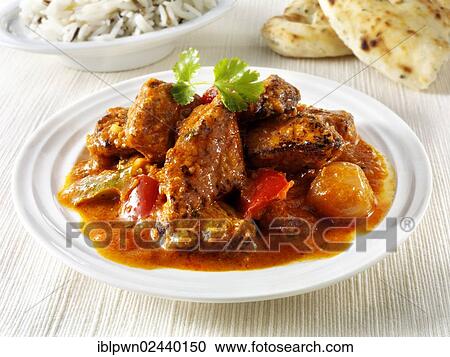 "Char grilled Chicken Jalfrezi with rice and naan bread, Indian food" View Large Photo Image Stock Image - "Char grilled Chicken Jalfrezi with rice and naan bread, Indian food". Fotosearch