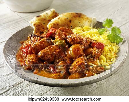 "Char grilled Chicken Jalfrezi with rice and naan bread, Indian food" View Large Photo Image Stock Photo - "Char grilled Chicken Jalfrezi with rice and naan bread, Indian food". Fotosearch