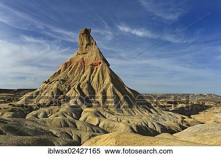 "Characteristic bizarre landscape of ocher clay, semidesert Bardenas Reales, UNESCO Biosphere Reserve, Navarra, northern Spain, Spain, Europe, PublicGround, Europe" View Large Photo Image Stock Photography - "Characteristic bizarre landscape of ocher clay, semidesert Bardenas Reales, UNESCO Biosphere Reserve, Navarra, northern Spain, Spain, Europe, PublicGround, Europe". Fotosearch