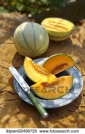 "Charentais melons, whole and cut" View Large Photo Image Stock Photography - "Charentais melons, whole and cut". Fotosearch