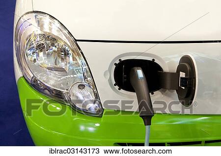 Stock Image - Charging an e-car. Fotosearch