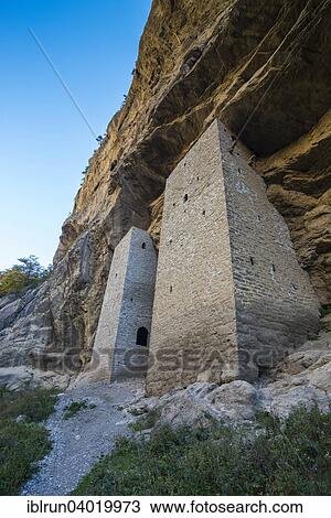 "Chechen watchtowers under overhanging cliff on the Argun river, near Itum Kale, Chechnya, Caucasus, Russia, Europe" View Large Photo Image Stock Image - "Chechen watchtowers under overhanging cliff on the Argun river, near Itum Kale, Chechnya, Caucasus, Russia, Europe". Fotosearch