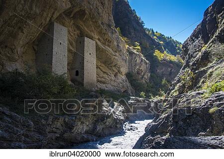 "Chechen watchtowers under overhanging cliff on the Argun river, near Itum Kale, Chechnya, Caucasus, Russia, Europe" View Large Photo Image Stock Image - "Chechen watchtowers under overhanging cliff on the Argun river, near Itum Kale, Chechnya, Caucasus, Russia, Europe". Fotosearch