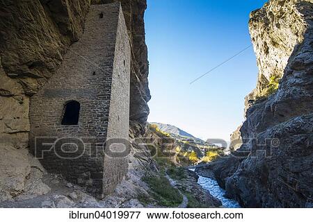 "Chechen watchtowers under overhanging cliff on the Argun river, near Itum Kale, Chechnya, Caucasus, Russia, Europe" View Large Photo Image Stock Photo - "Chechen watchtowers under overhanging cliff on the Argun river, near Itum Kale, Chechnya, Caucasus, Russia, Europe". Fotosearch